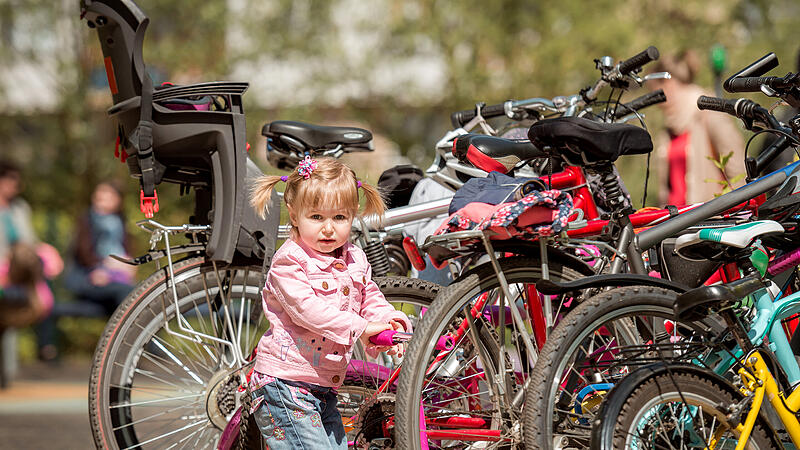 little girl with her scooter