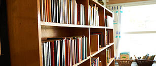 a bookshelf at a school library