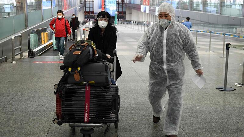 Peking:Alle Einreisenden unter Quarantäne gestellt