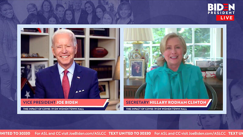 Democratic U.S. presidential candidate Joe Biden reacts as Hillary Clinton endorses him for president during online town hall